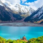 Big Almaty Lake with snow-capped Trans-Ili Alatau peaks near Almaty
