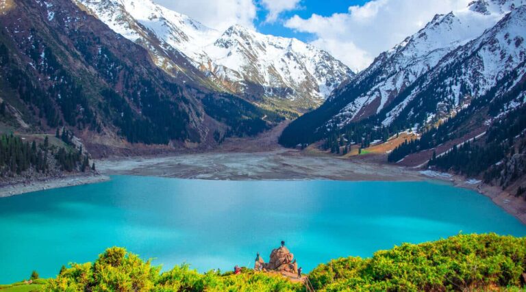 Big Almaty Lake with snow-capped Trans-Ili Alatau peaks near Almaty